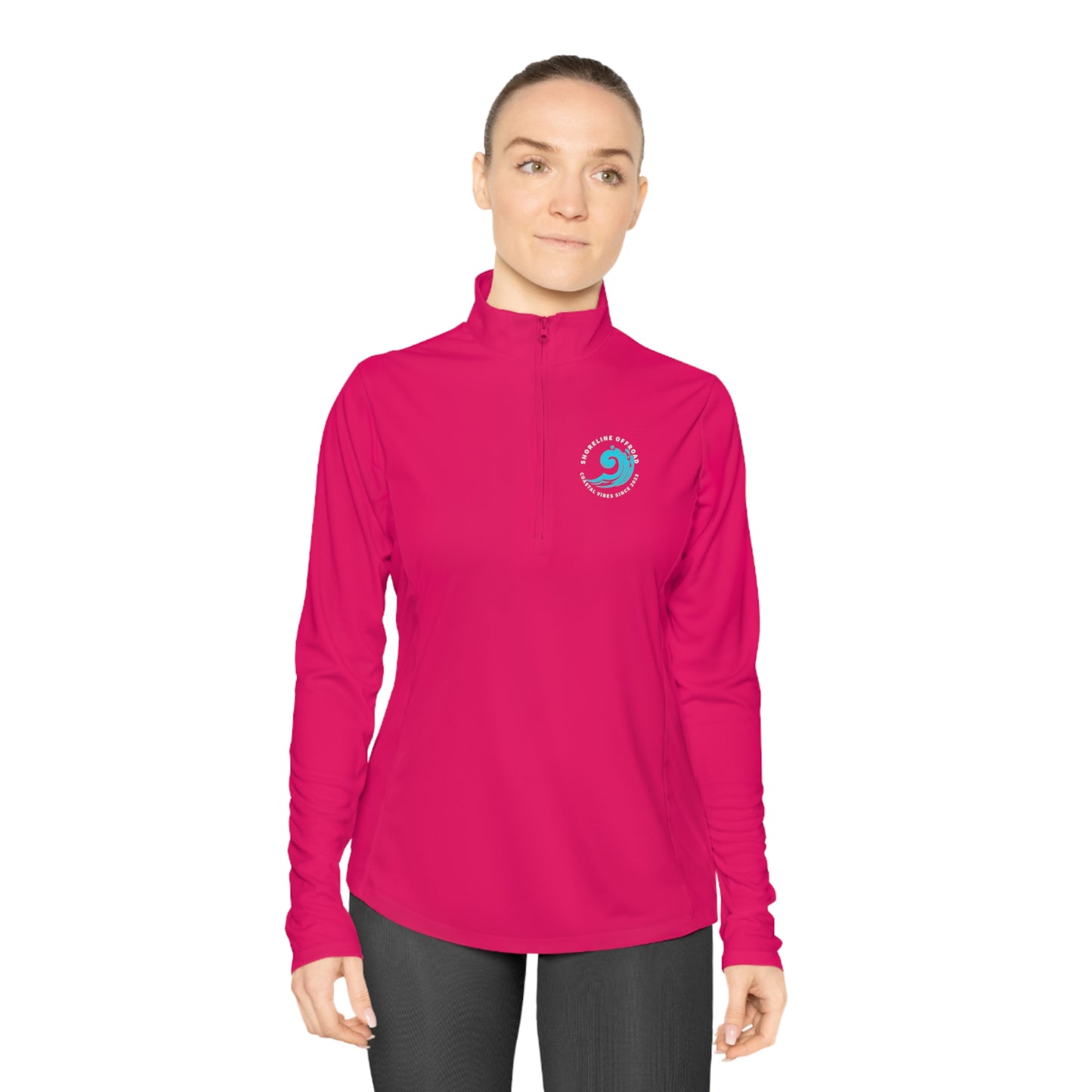 a woman wearing a pink shirt and black pants