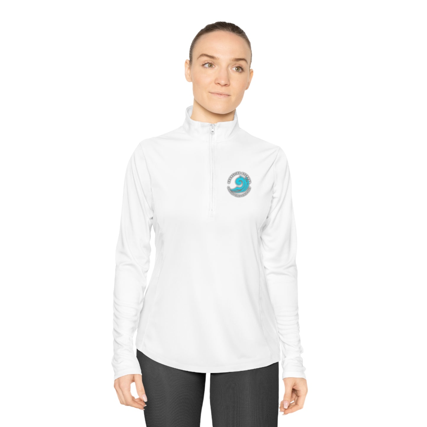 a woman wearing a white shirt and black pants