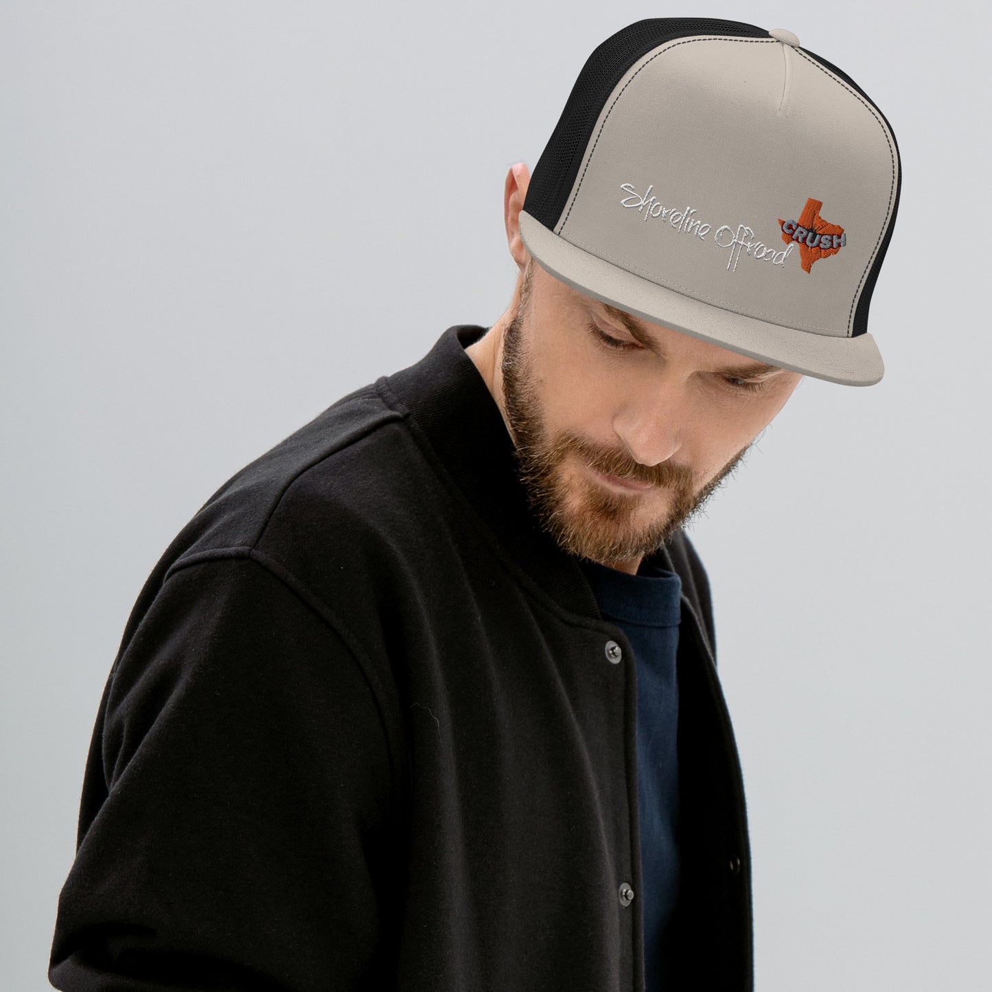 a man with a beard wearing a hat
