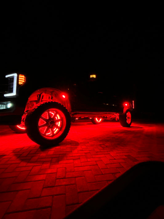 Truck with bright rock lights and wheel lights