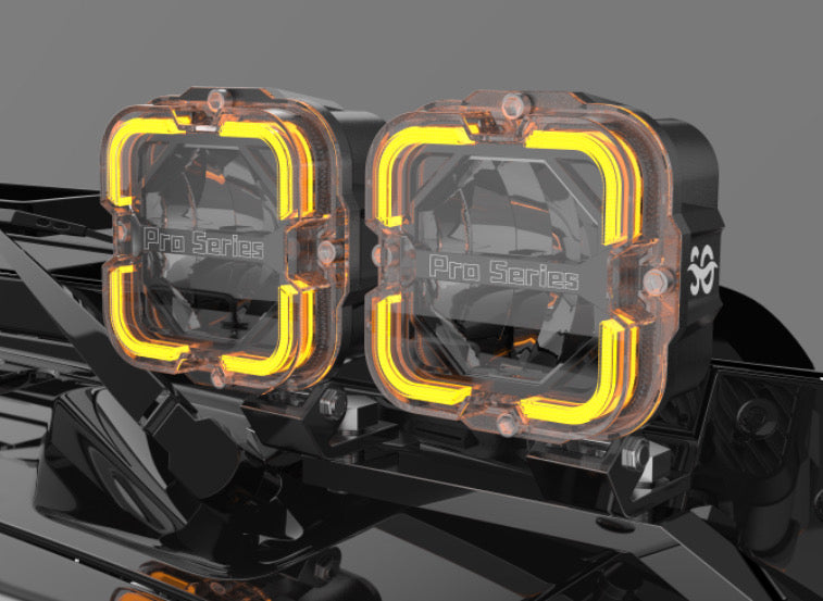Close-up view of the Shoreline Offroad Pro Series Bright White LED 4” Pods with Amber DRL, highlighting the dual pod lights equipped with amber DRL. These Bright white lights serve as essential ditch lights and offroad accessories, providing reliable performance wherever the adventure takes you.