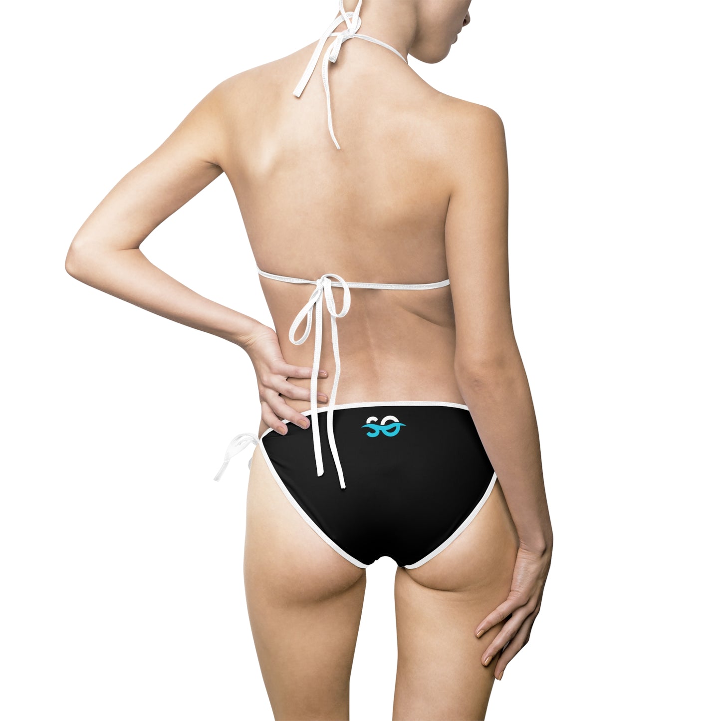 a woman in a black and white bikini bottom