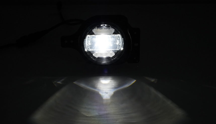 Shoreline Offroad Pro Series LED 4” RGB Fog lights showcasing a bright white beam, ideal as headlight replacements for Jeep JL JT models, designed for efficient lighting as part of Pro Series lighting accessories.