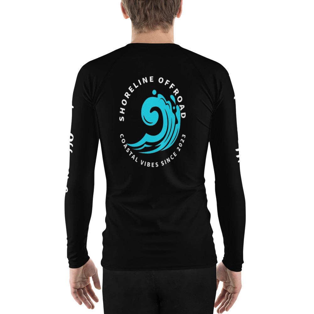 a man wearing a black shirt with a blue wave on it