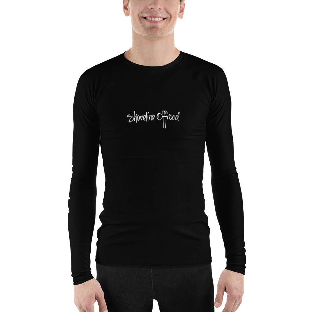 a man wearing a black long sleeve shirt