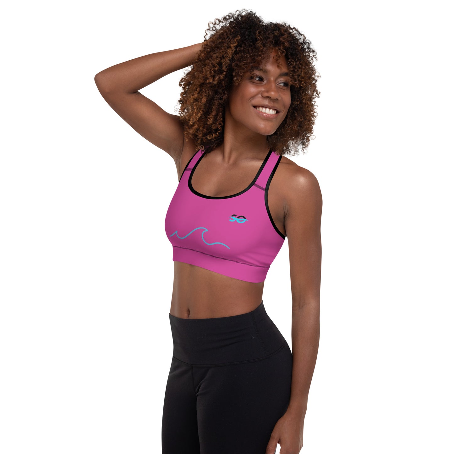 a woman in a pink sports bra top