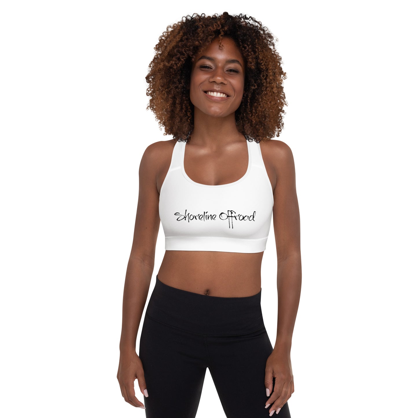 a woman wearing a white sports bra top