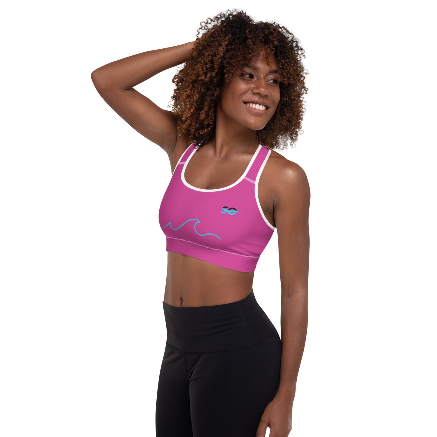 a woman in a pink sports bra top