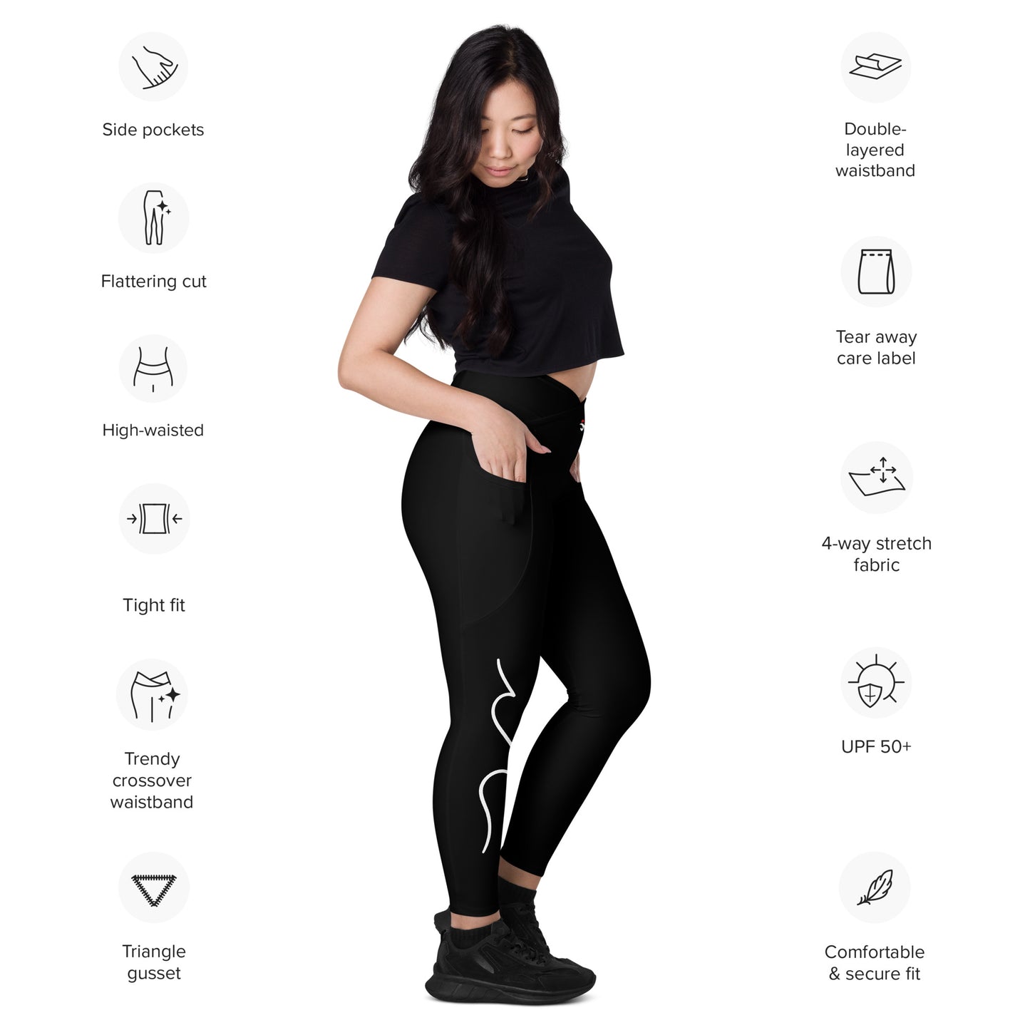 a woman wearing a black top and black leggings