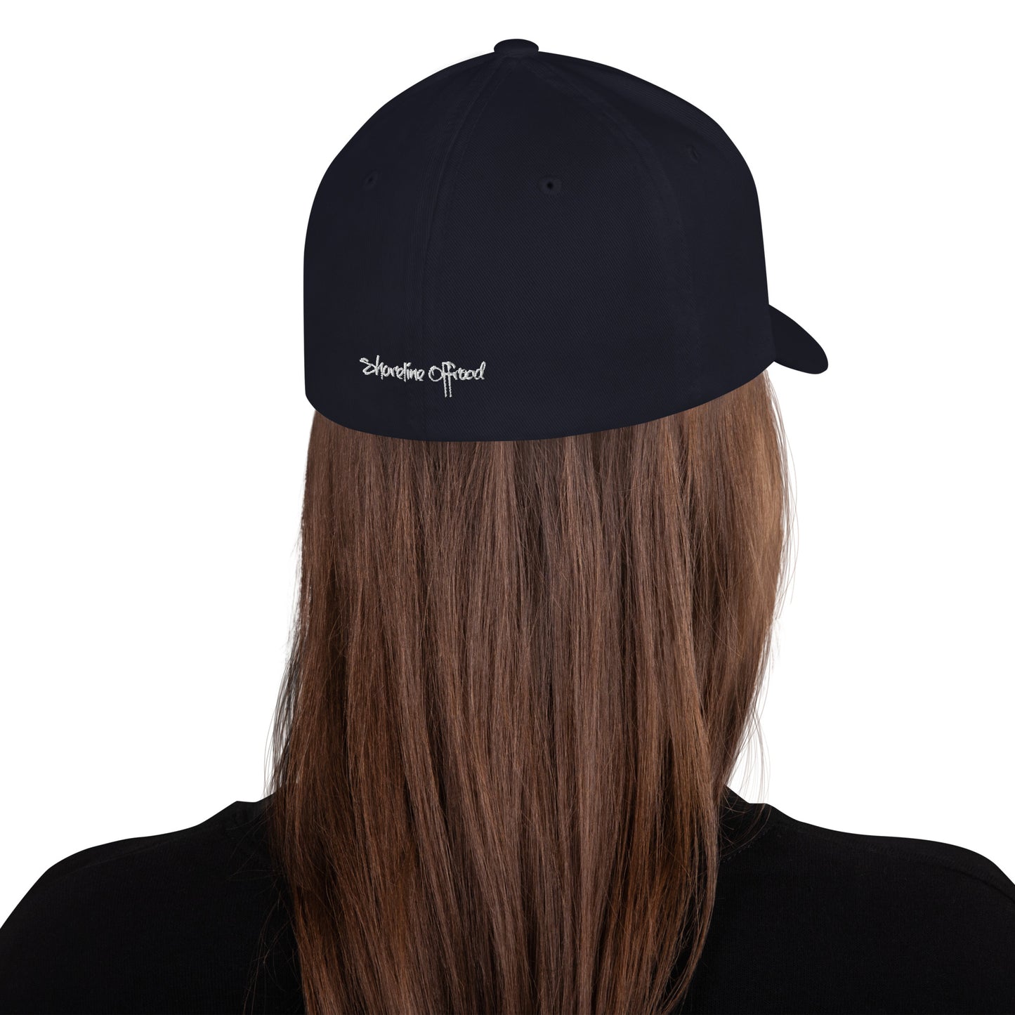the back of a person wearing a black hat