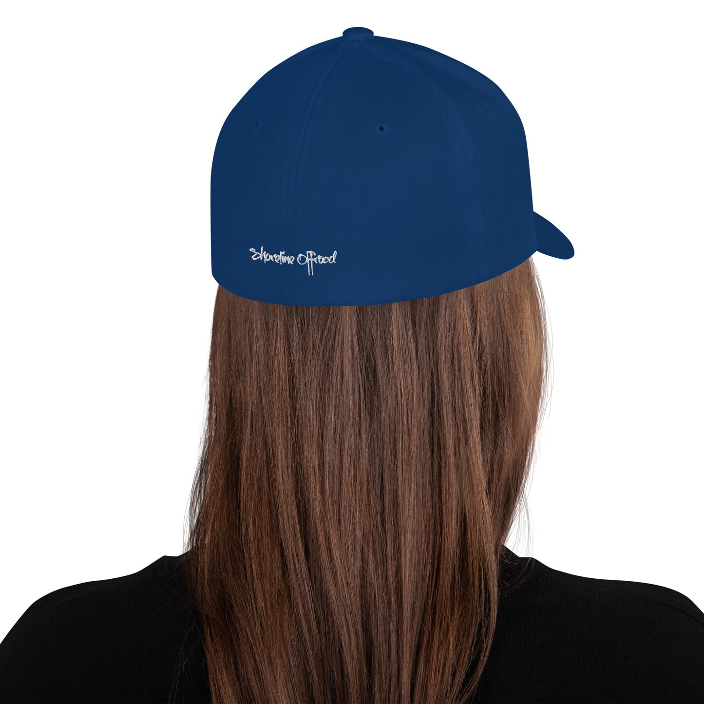 a woman with long hair wearing a blue hat
