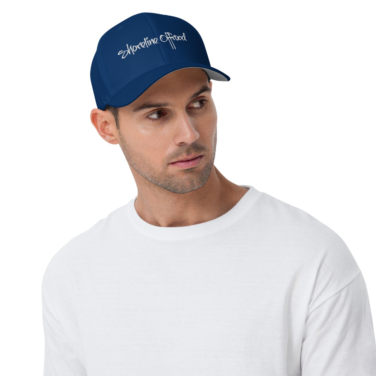 a man in a white shirt and a blue hat