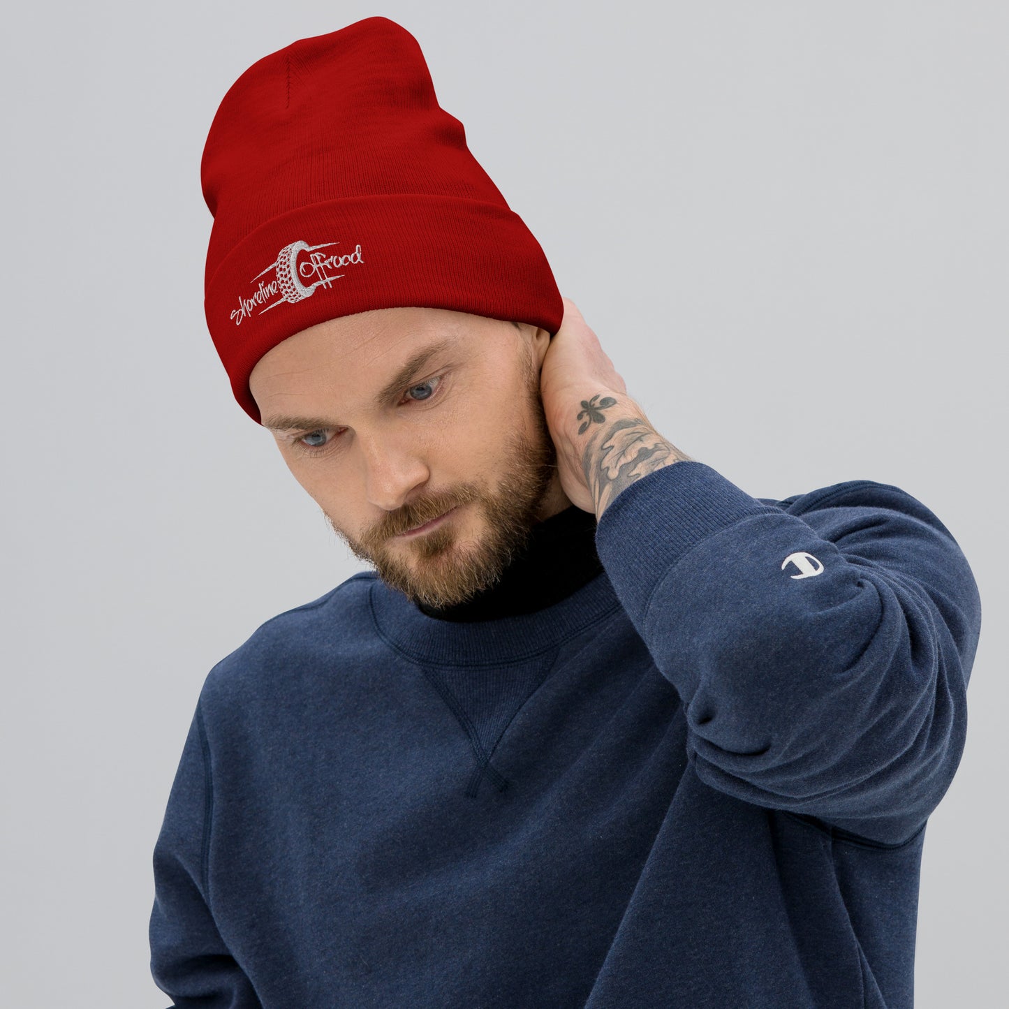a man with a red hat on his head