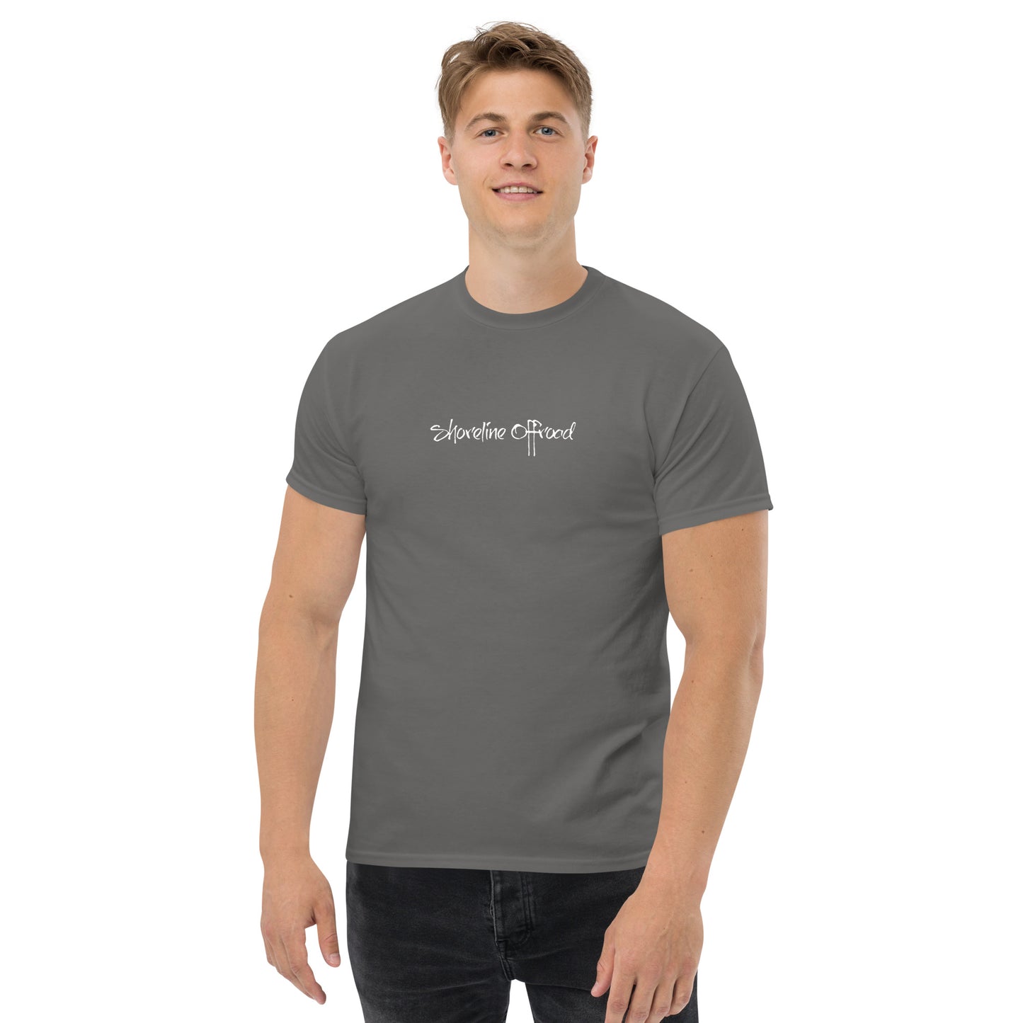 a man wearing a grey t - shirt with the words, happiness is the reason