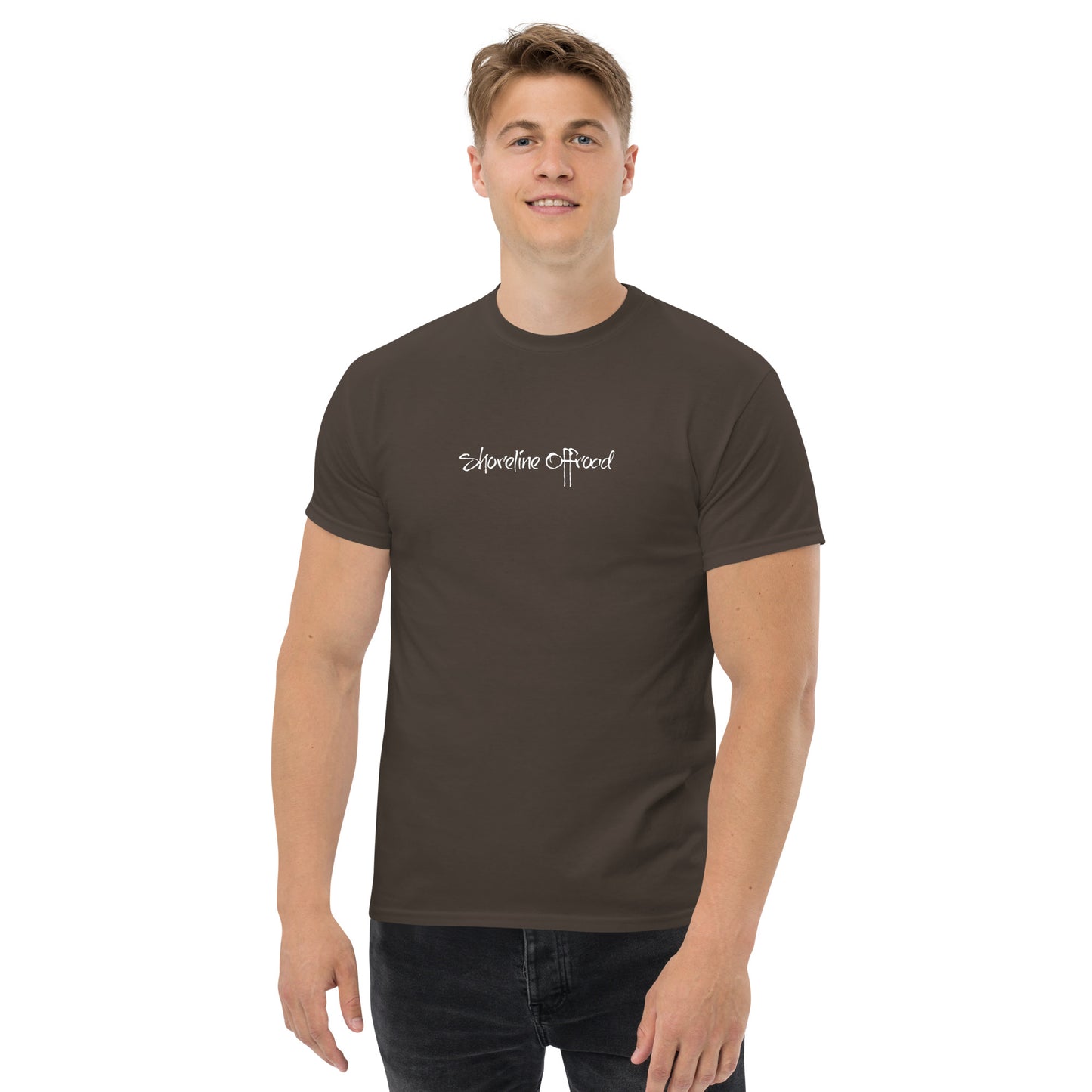 a man wearing a brown t - shirt with a white logo