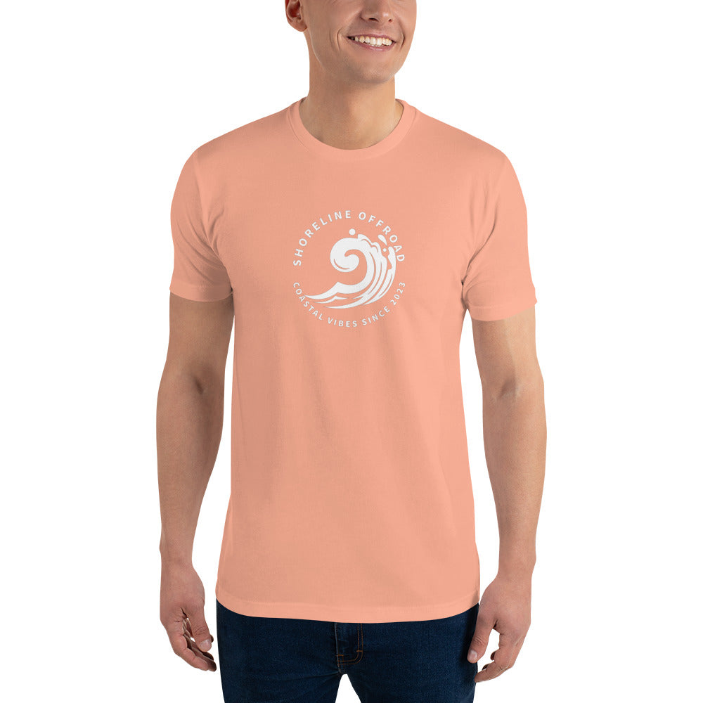 a man wearing an orange shirt with a white wave on it