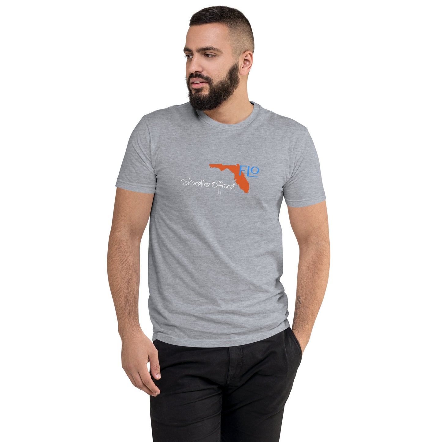 a man with a beard wearing a grey t - shirt