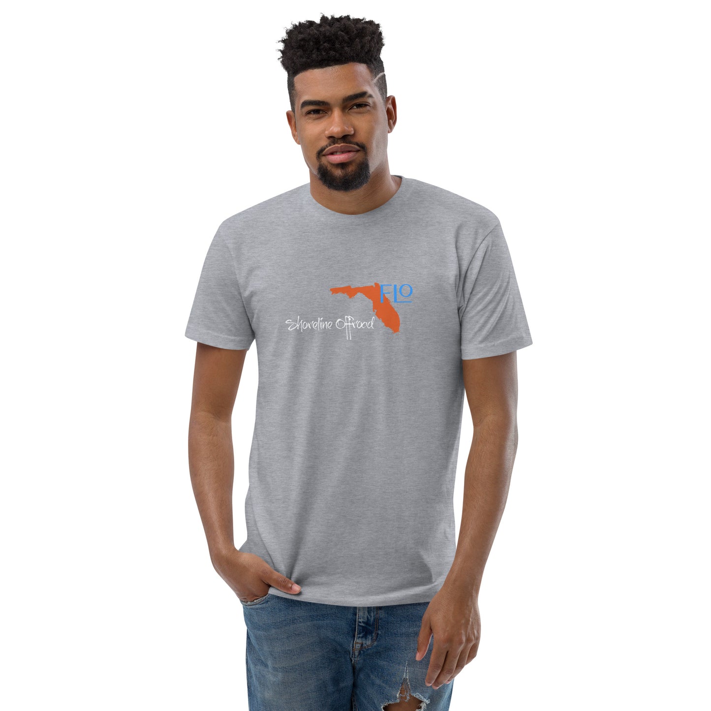 a man wearing a gray t - shirt with an orange bird on it