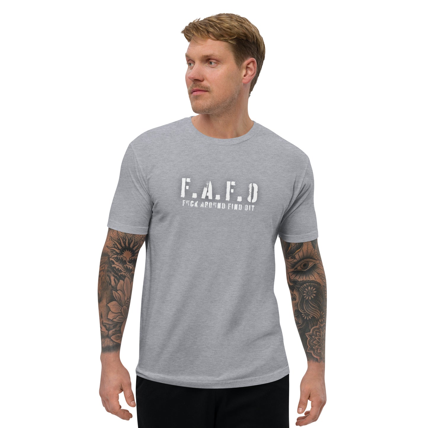 a man wearing a grey t - shirt with the word fafd on it