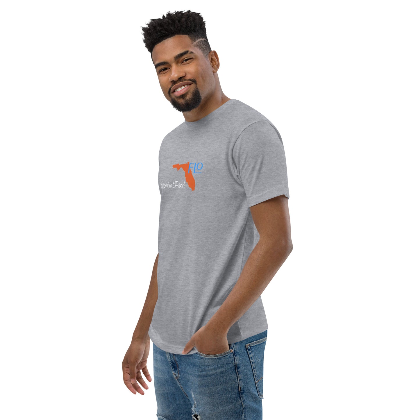 a man wearing a gray t - shirt with a blue and orange logo
