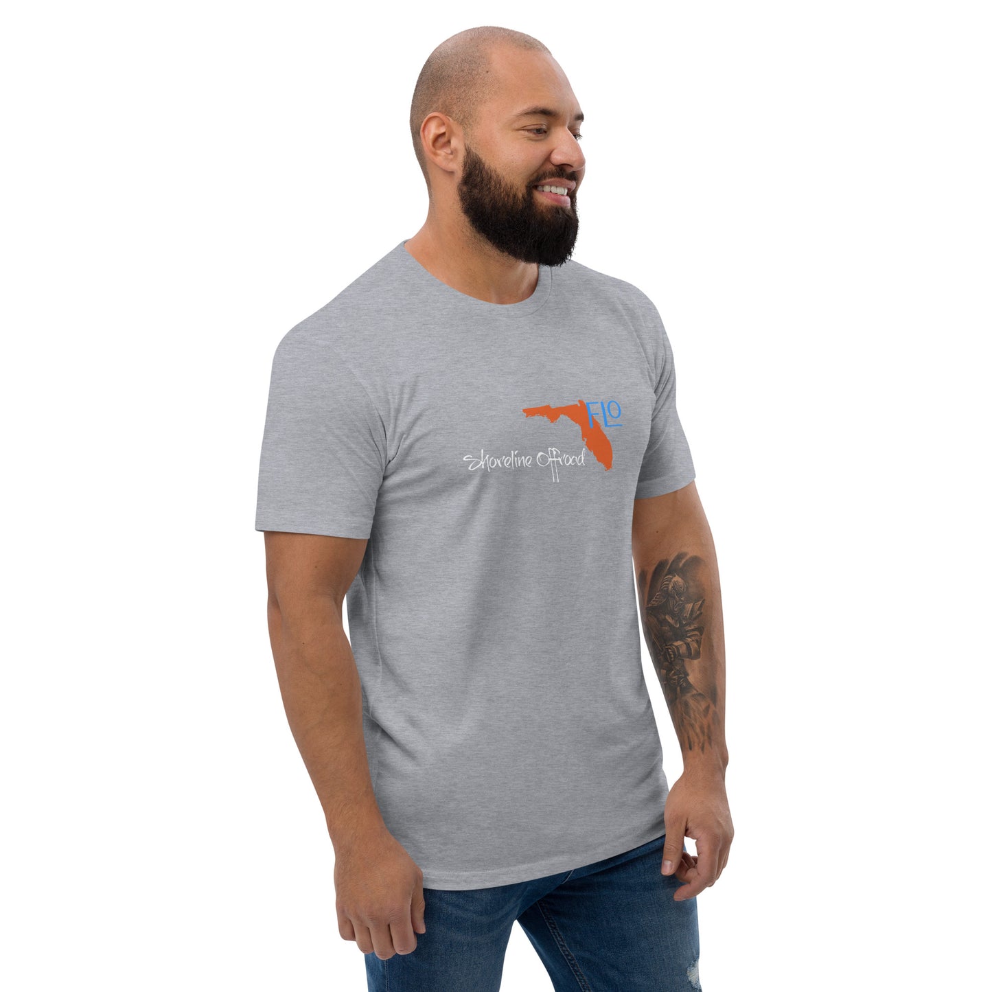 a man with a beard wearing a grey t - shirt