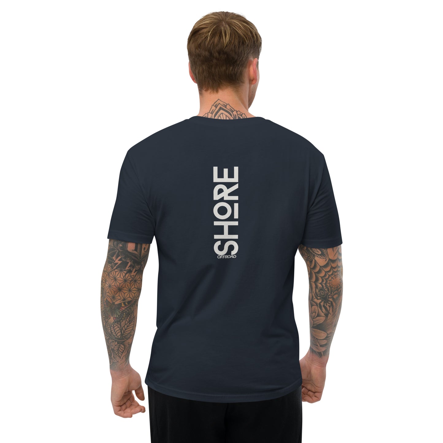 a man wearing a black shirt with the words shop on it