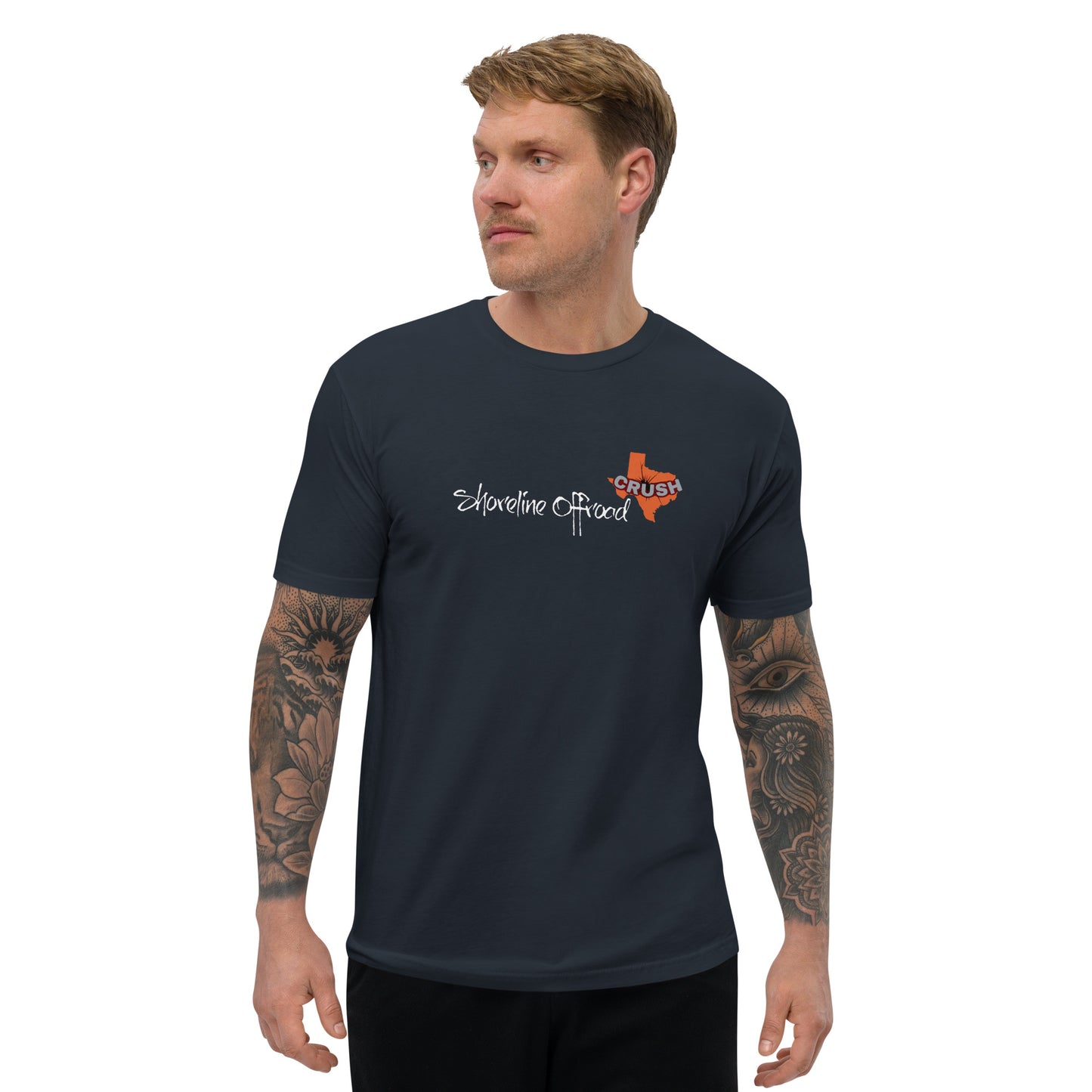 a man wearing a black shirt with a tattoo on his arm