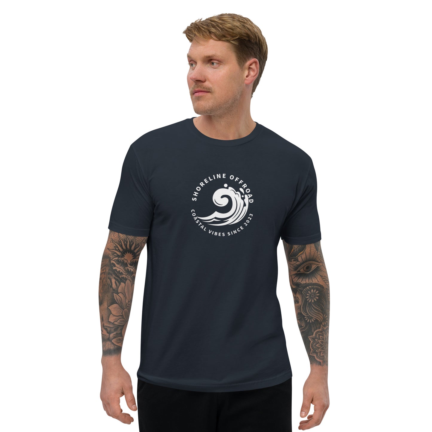 a man wearing a black t - shirt with a white logo