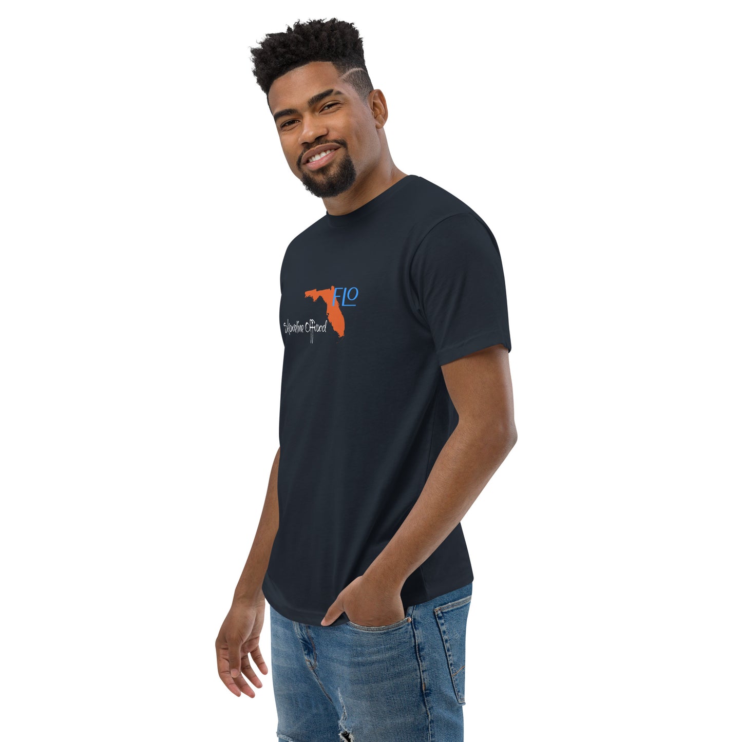 a man wearing a black t - shirt and jeans