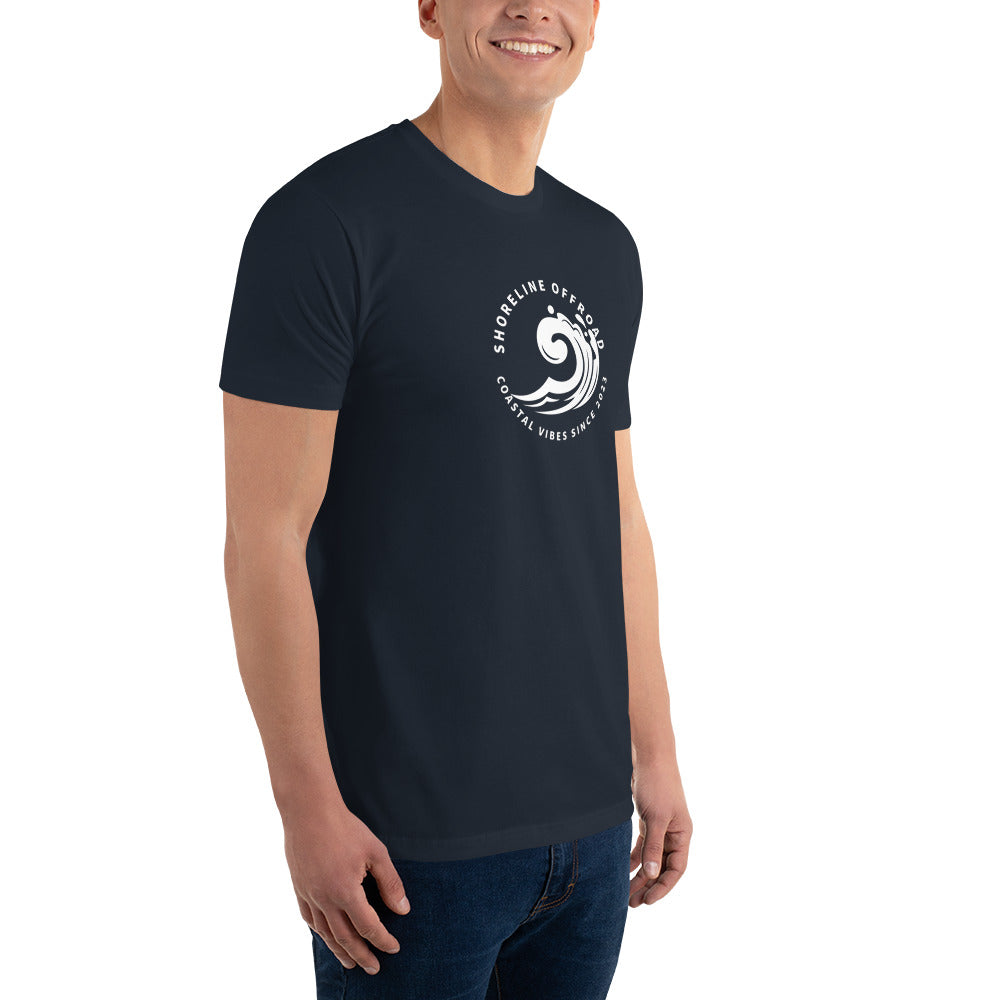 a man wearing a black t - shirt with a white logo