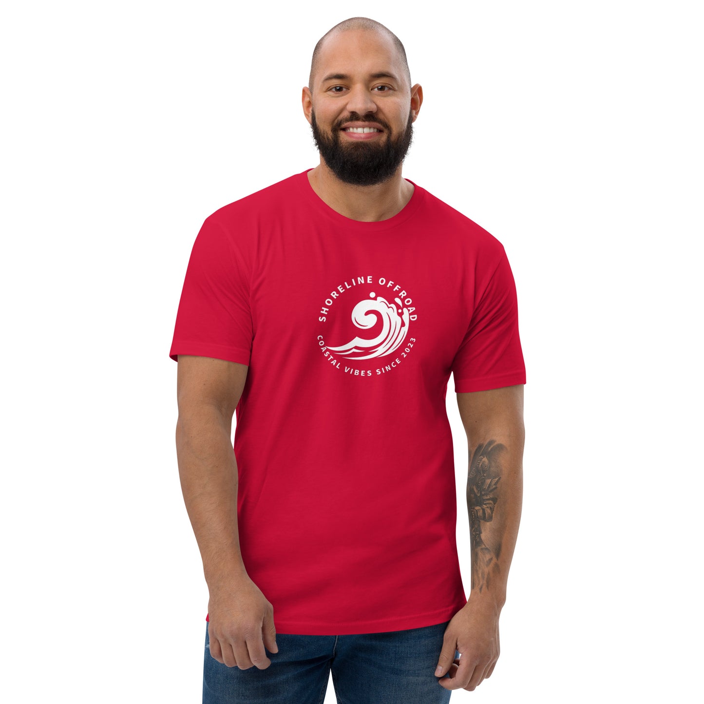 a man with a beard wearing a red t - shirt