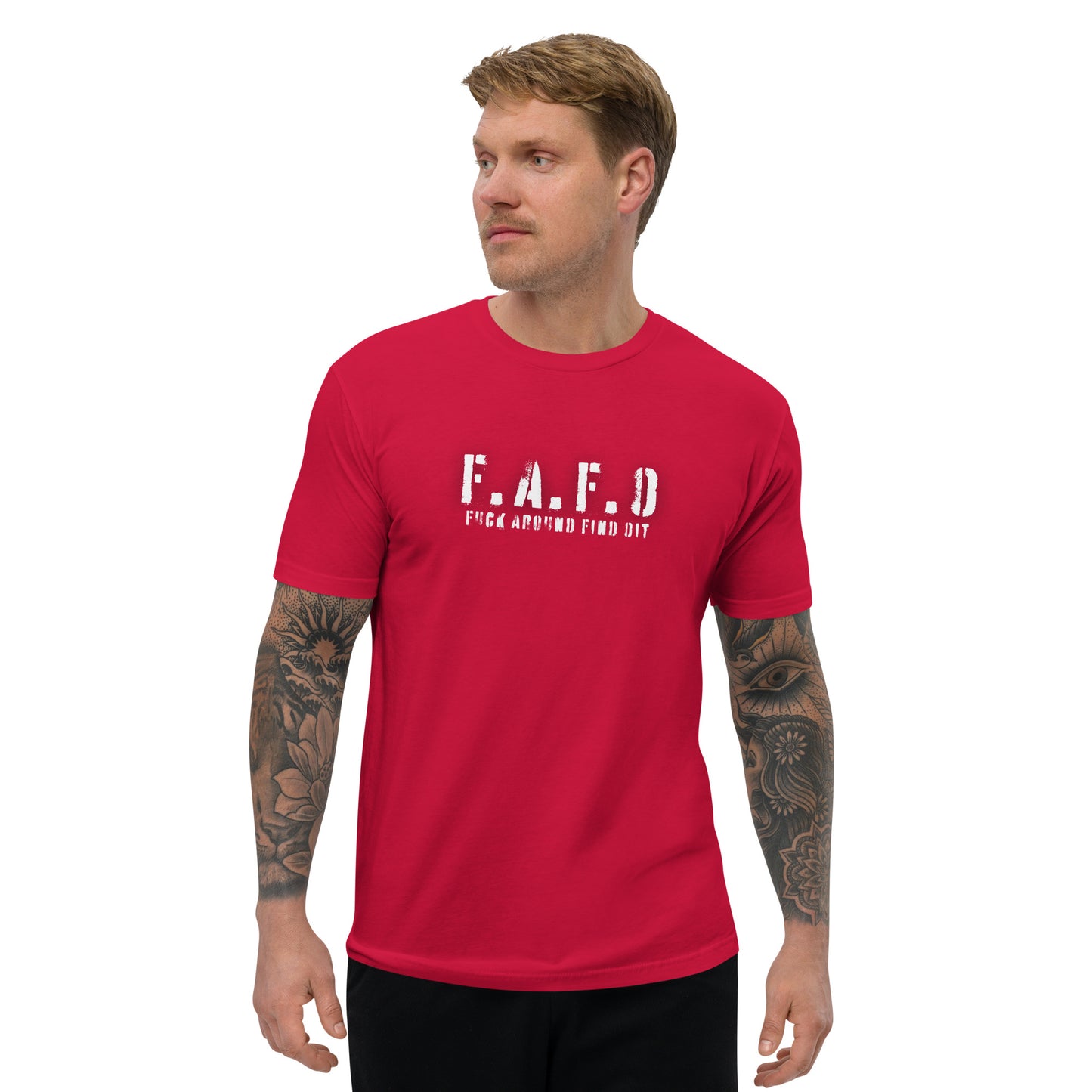 a man with a tattooed arm wearing a red t - shirt