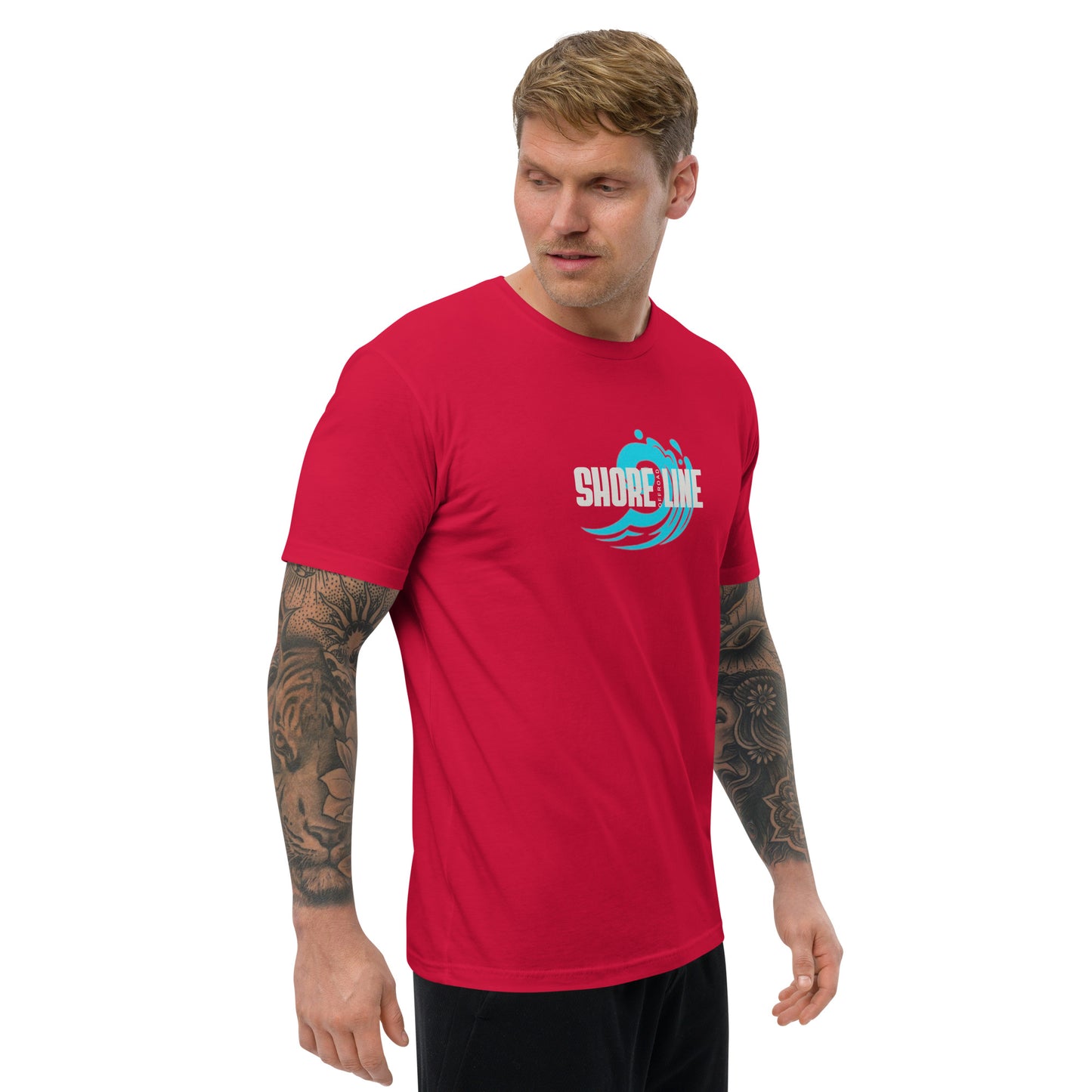 a man wearing a red shirt and black shorts