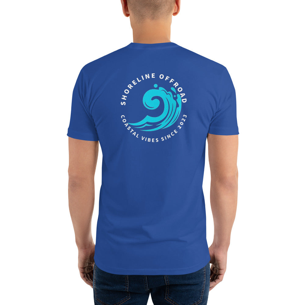 a man wearing a blue t - shirt with a blue wave on it