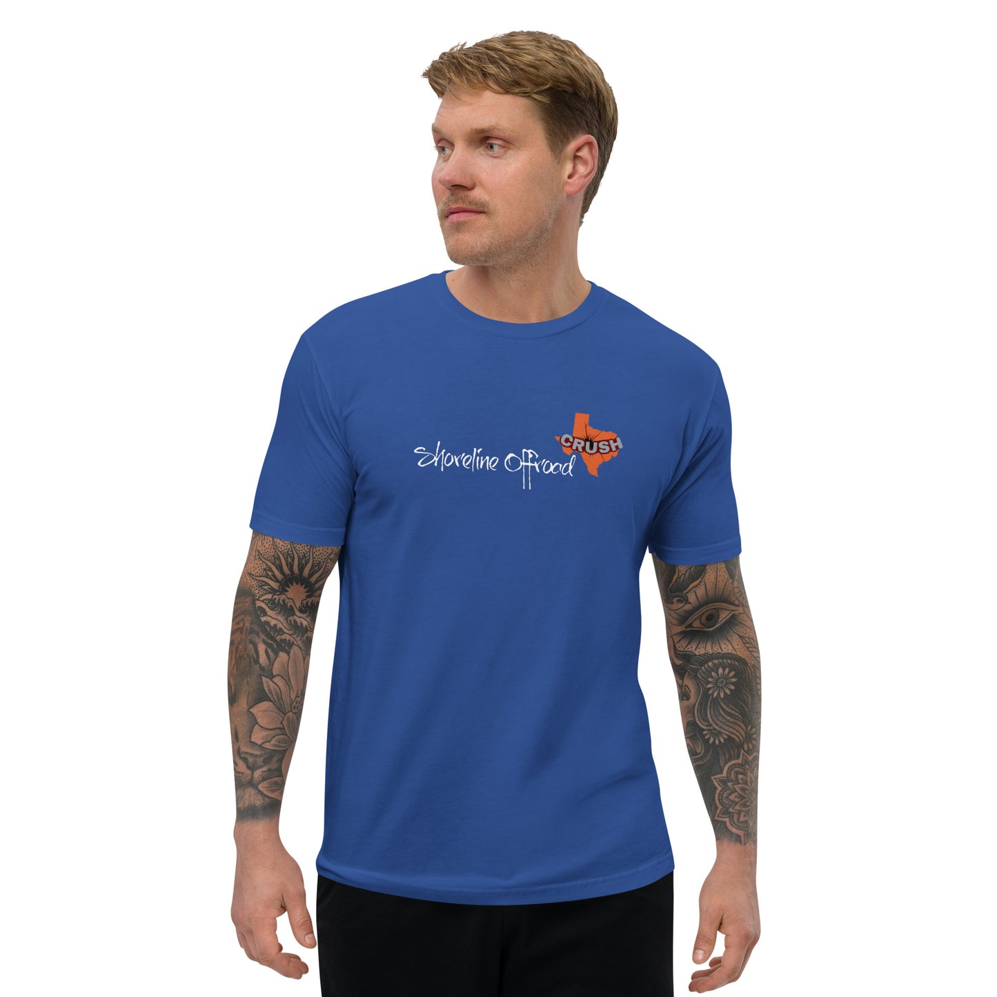 a man wearing a blue t - shirt with the logo of a fish on it