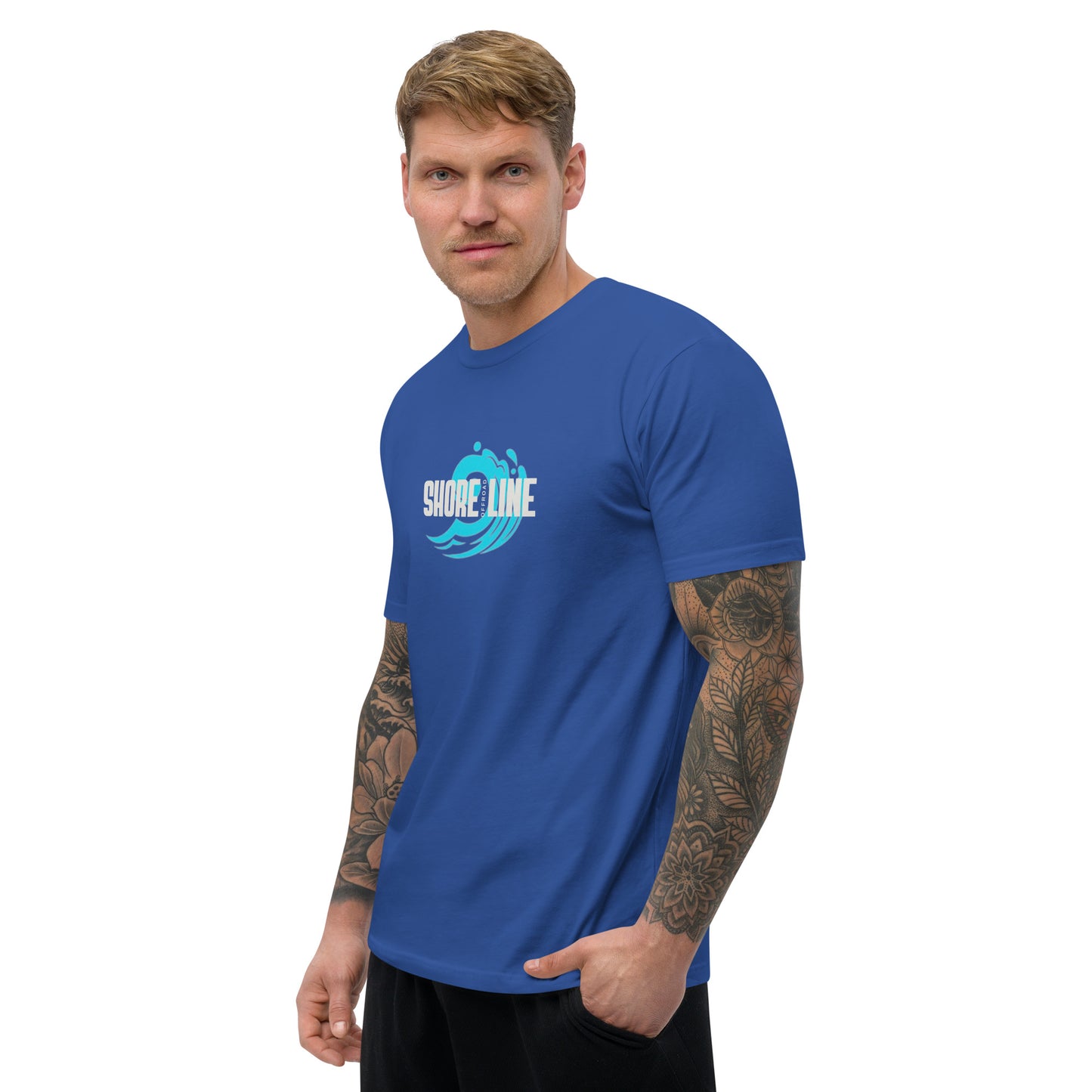a man with a tattoo on his arm wearing a blue shirt