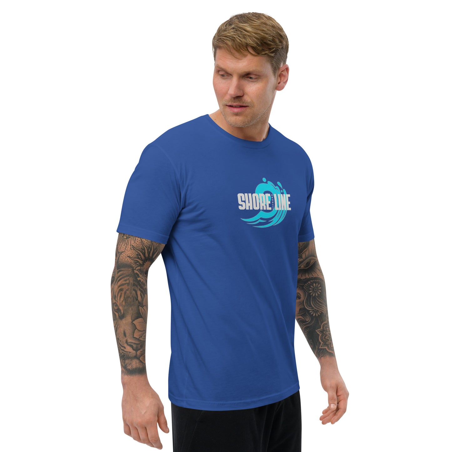 a man wearing a blue shirt and black shorts