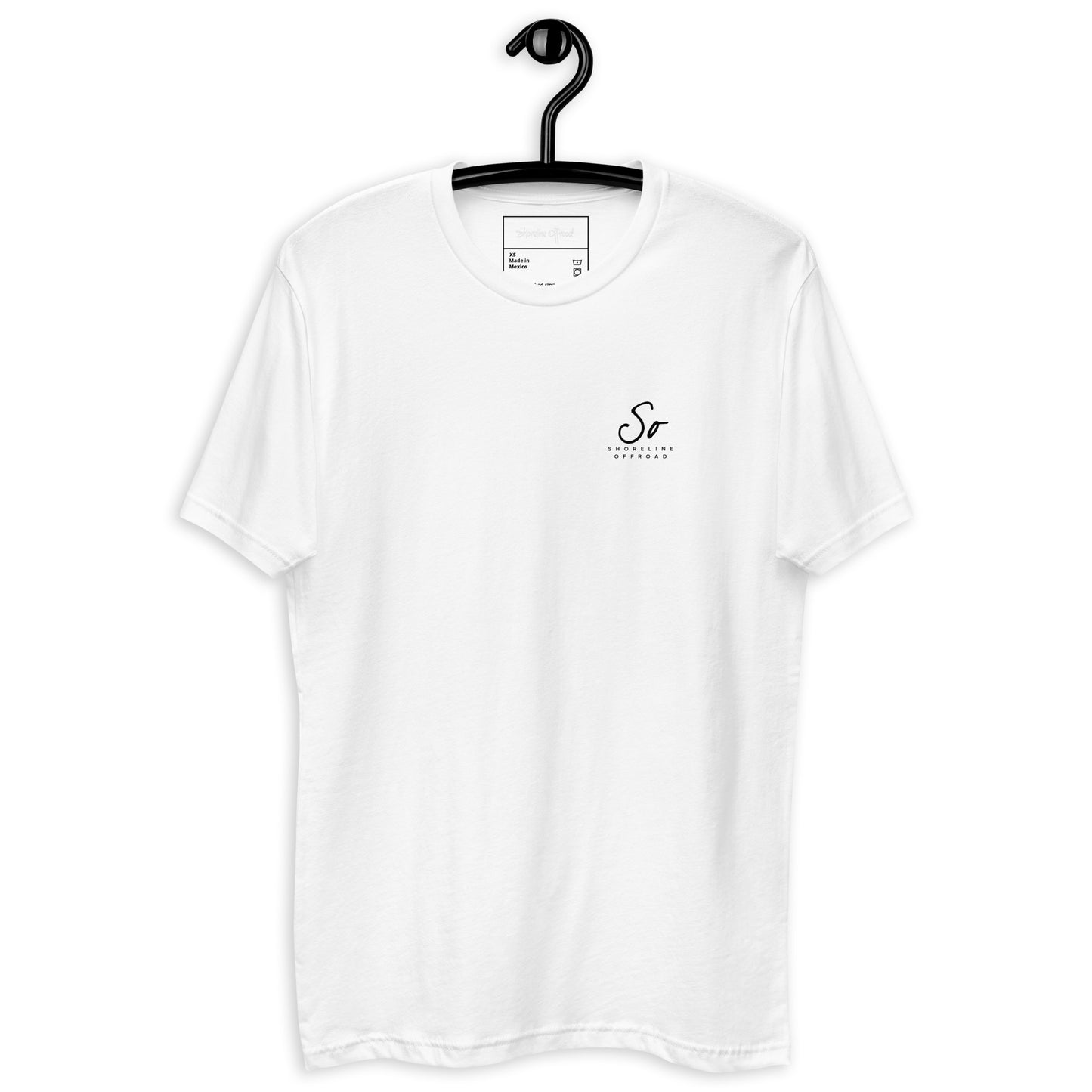 a white t - shirt hanging on a black hanger