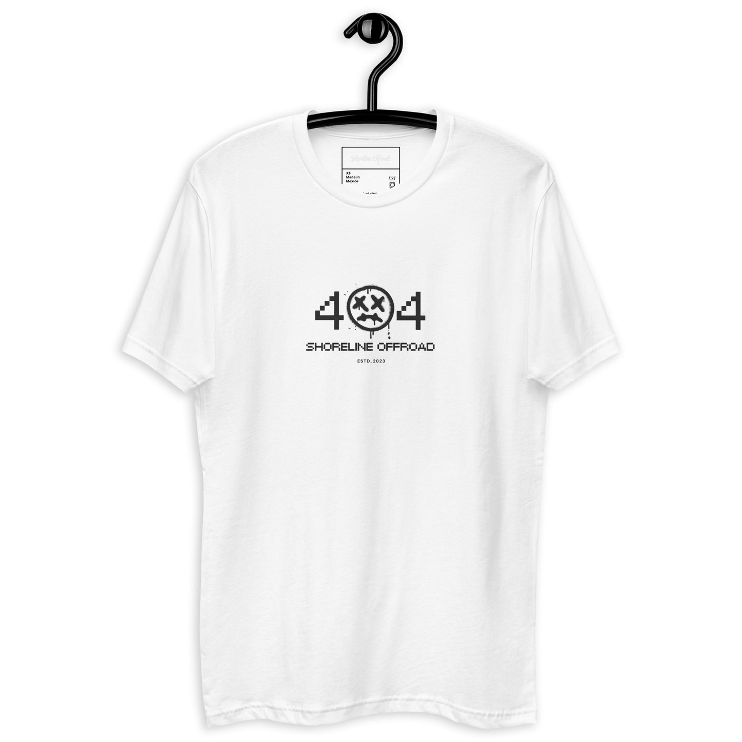 a white t - shirt hanging on a black hanger