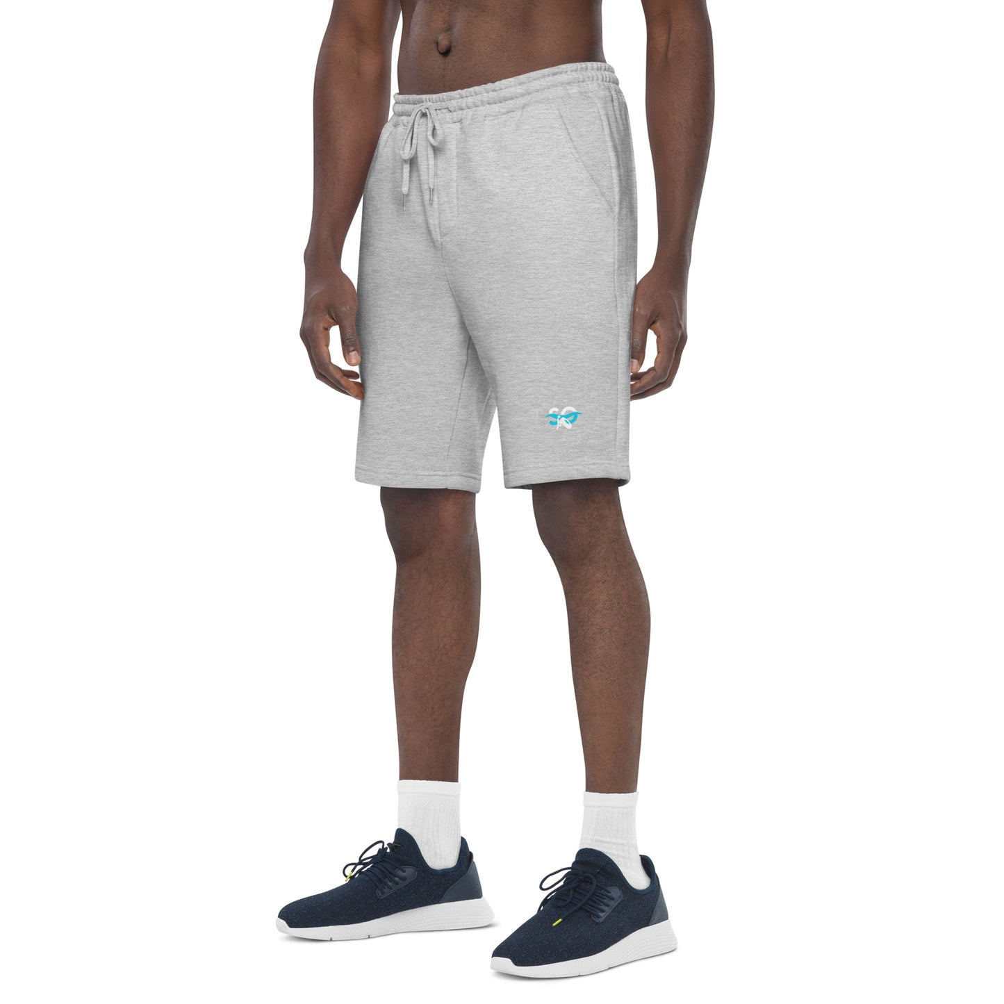 a man wearing a pair of grey shorts