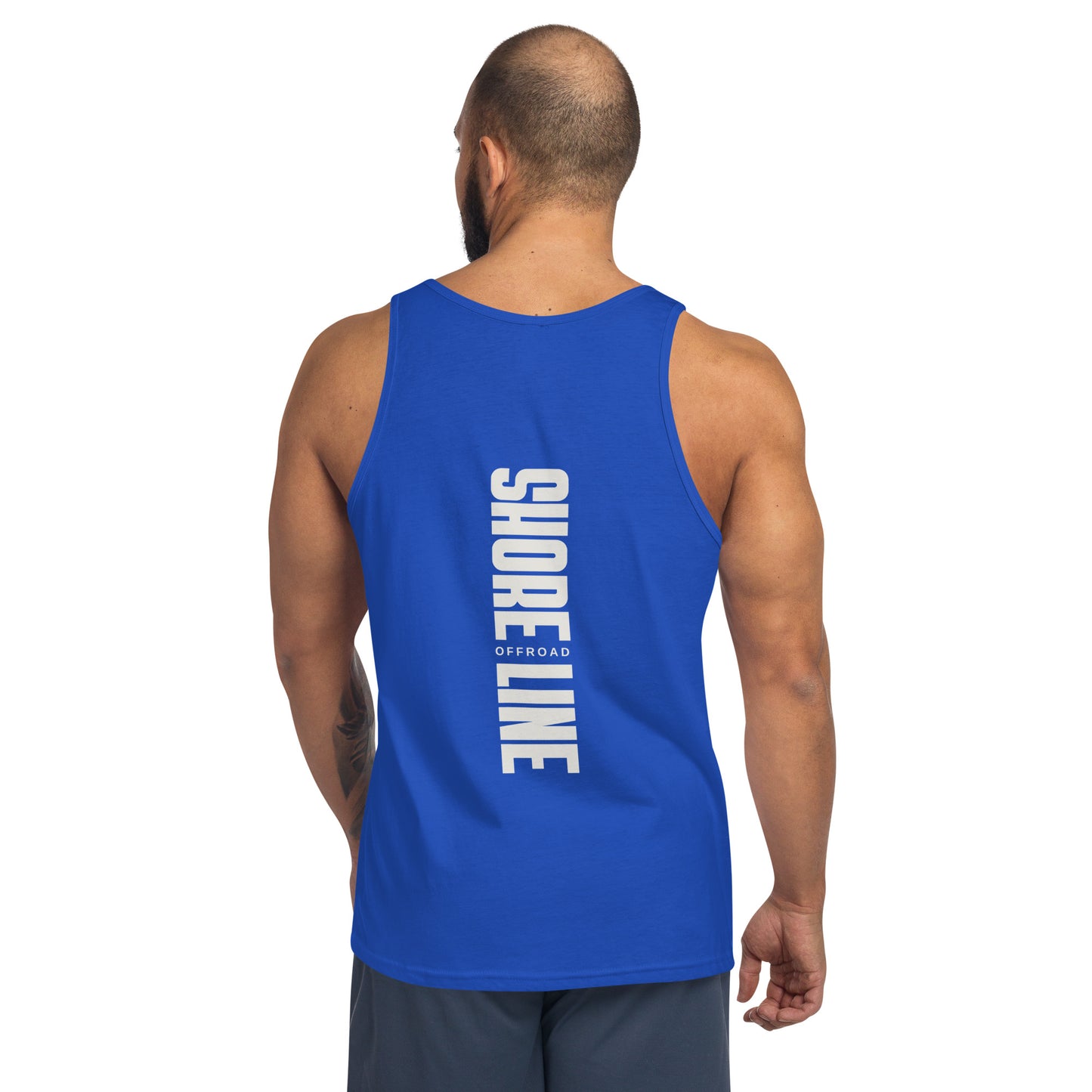a man wearing a blue tank top with white lettering