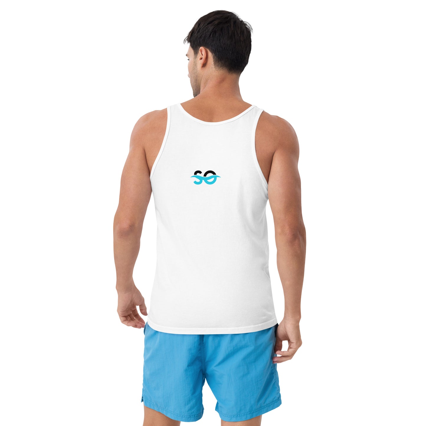 a man wearing a white tank top and blue shorts