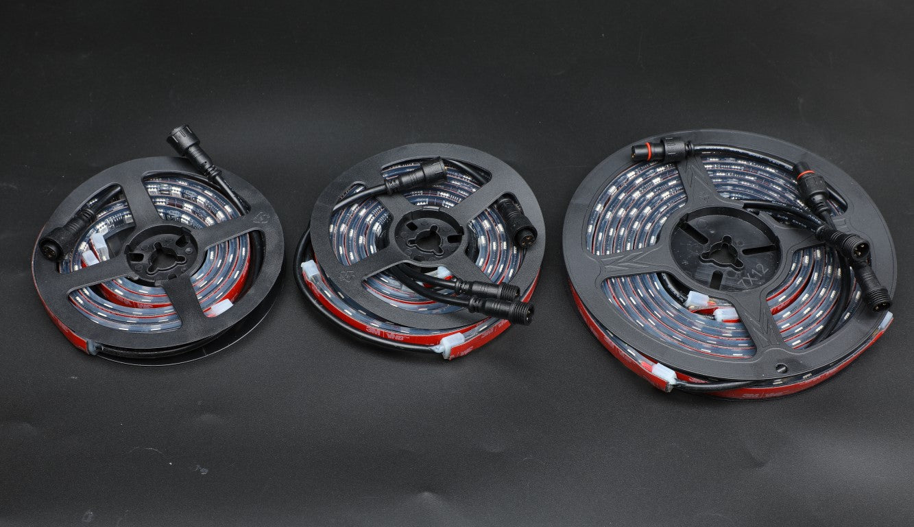 a couple of reels of light sitting on top of a table