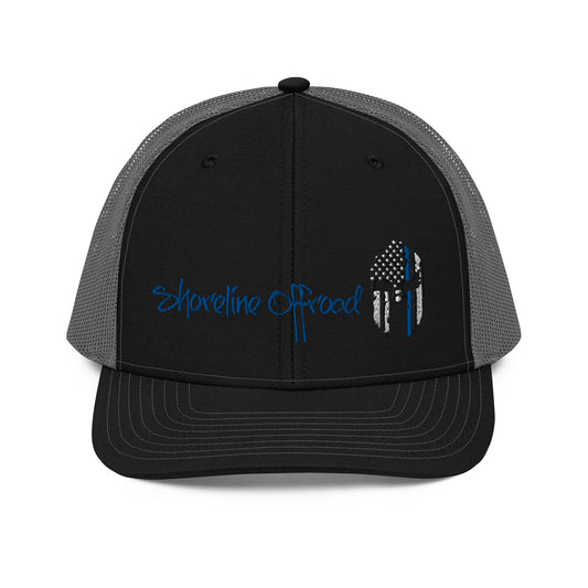 a black and gray trucker hat with an american flag on it