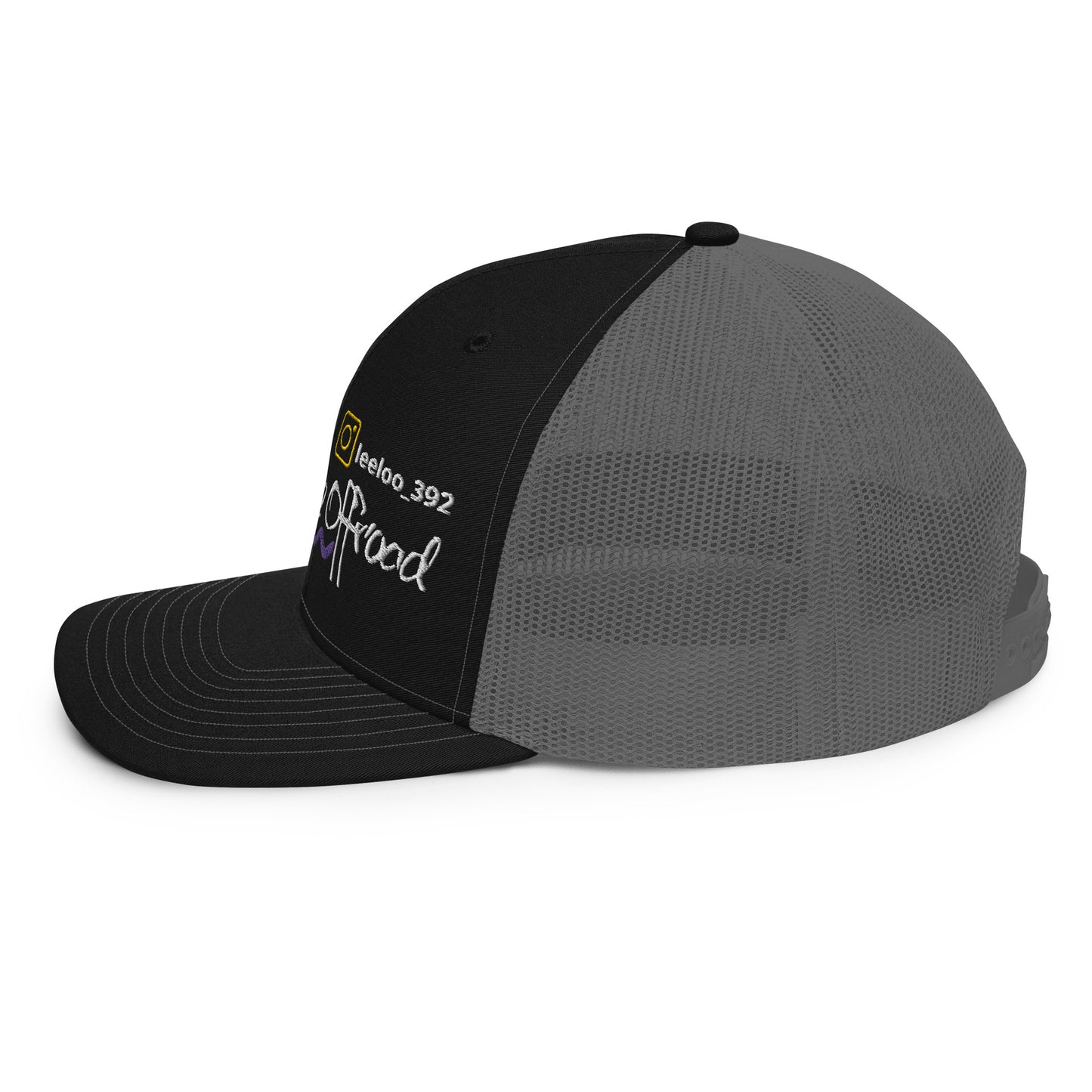 a black and grey hat with the word good on it