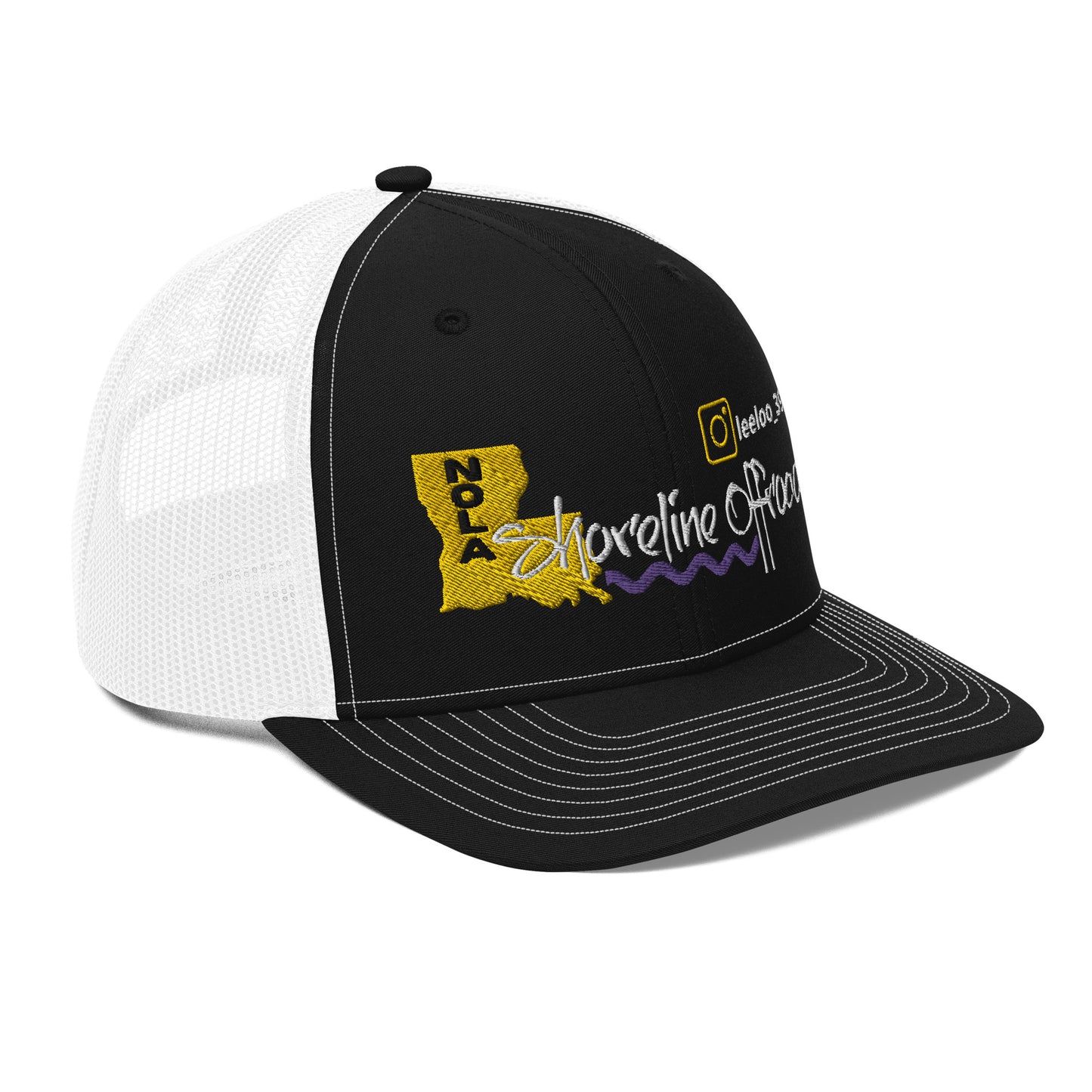 a black and white trucker hat with the state of minnesota on it