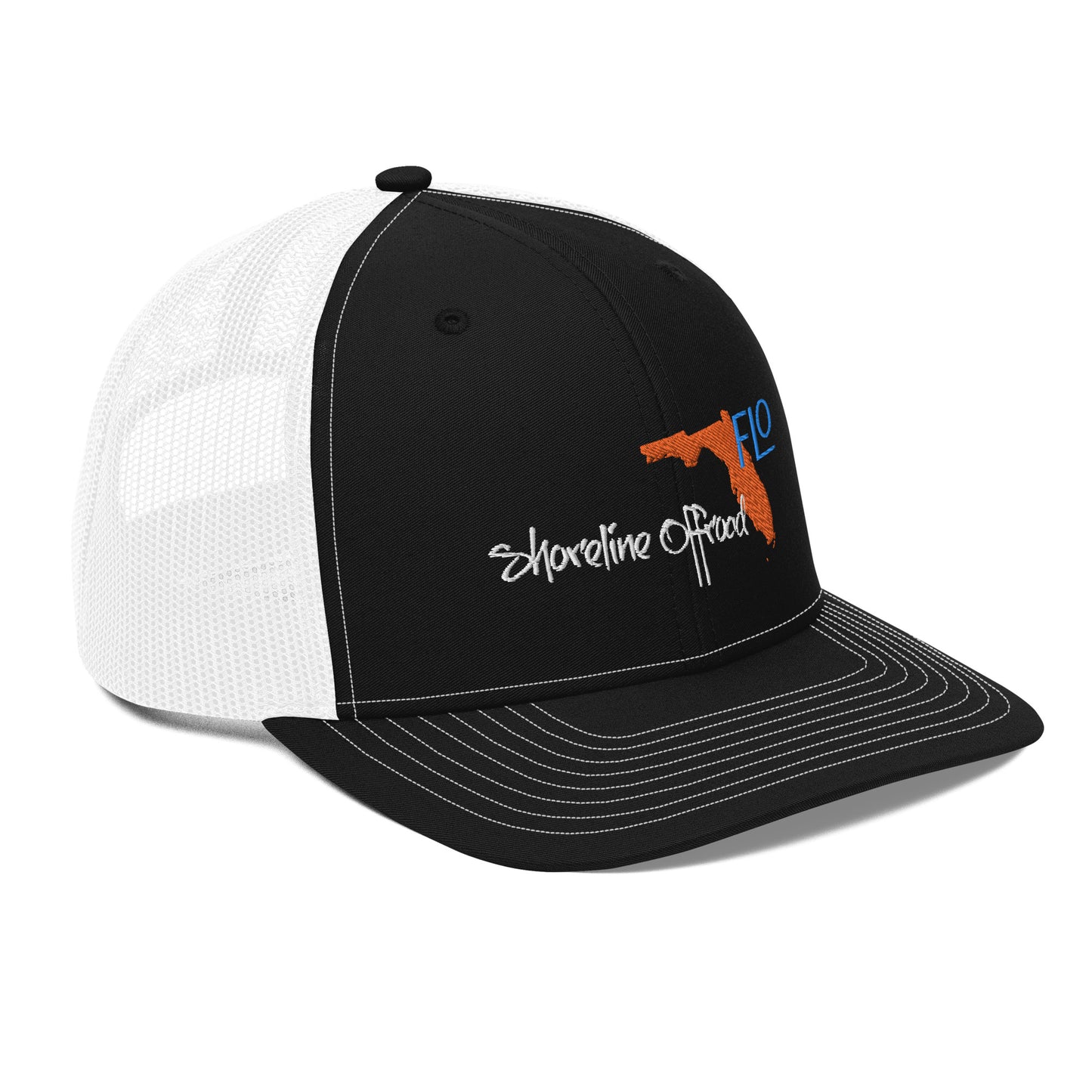 a black and white trucker hat with an orange logo