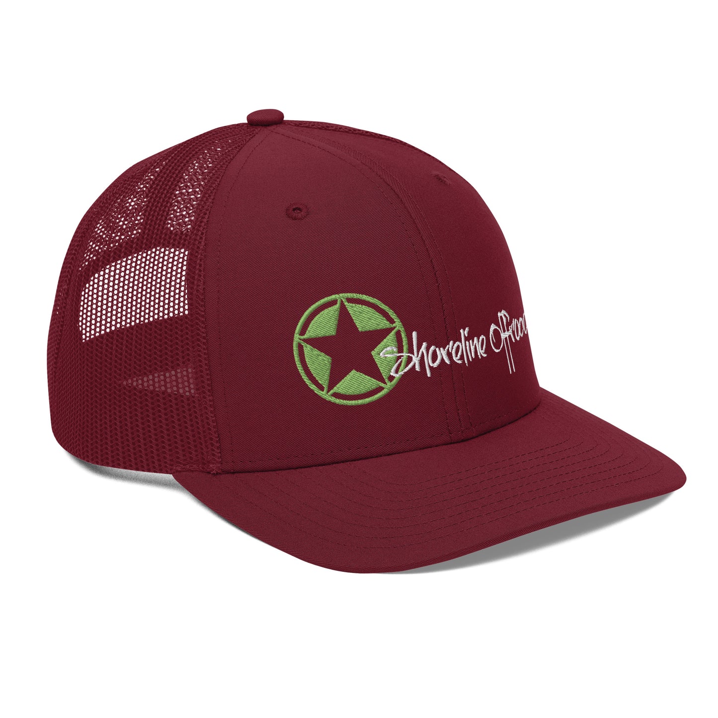 a maroon trucker hat with a green star on the front