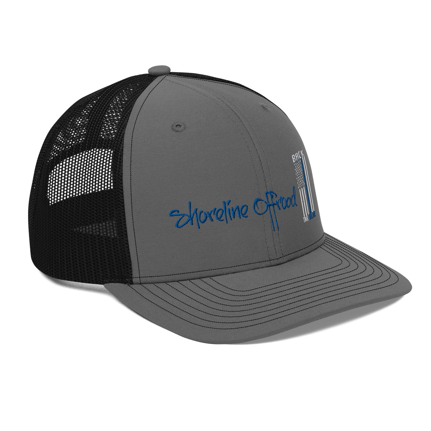 a gray and black trucker hat with the words shoreline beach on it
