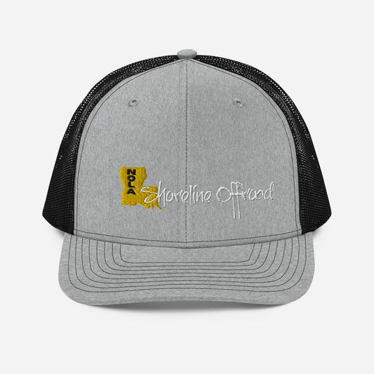 a gray and black trucker hat with a yellow logo
